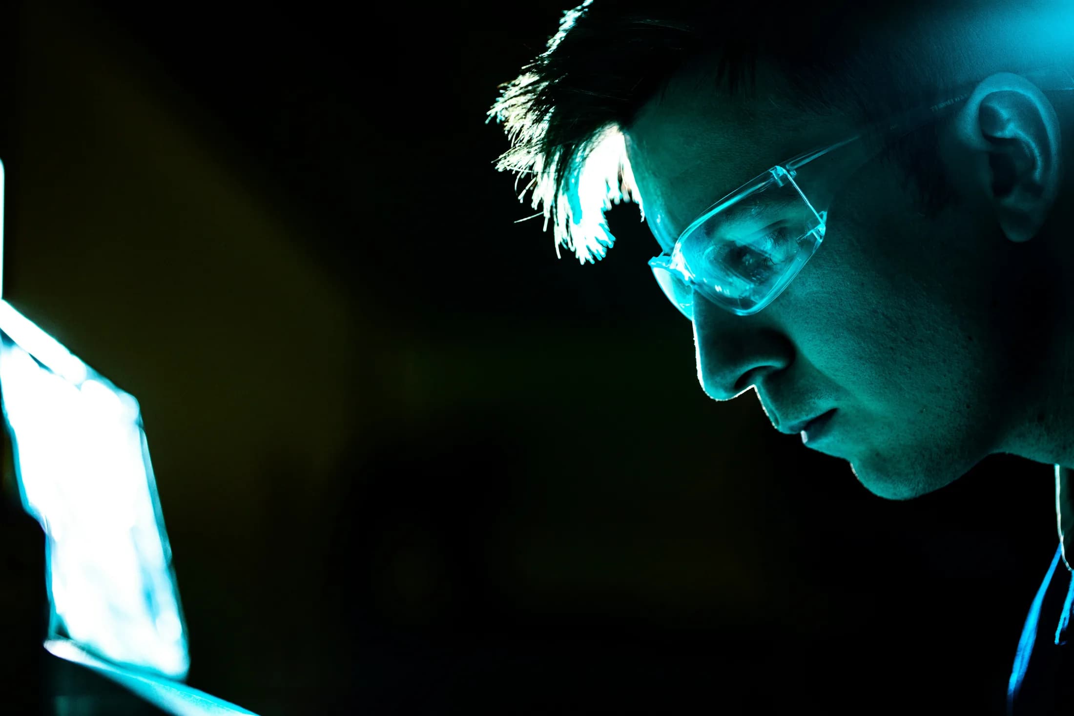 Research scientist working with AI technology and data visualization
